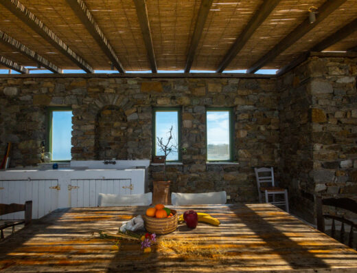 03 Pool dining table e-Mykonos | Hotels, Rentals & Services in Mykonos